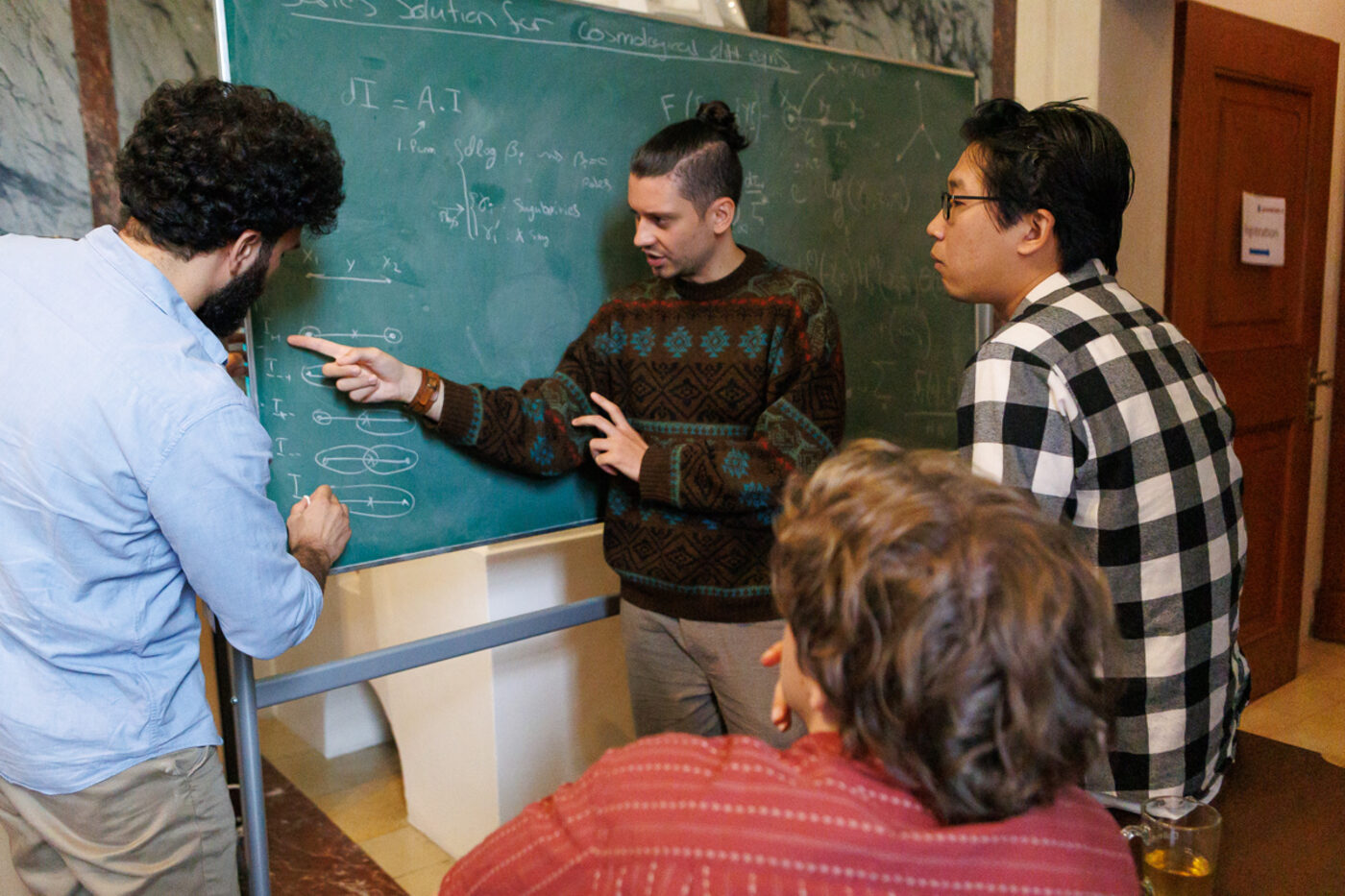 Blackboard discussion at a group retreat