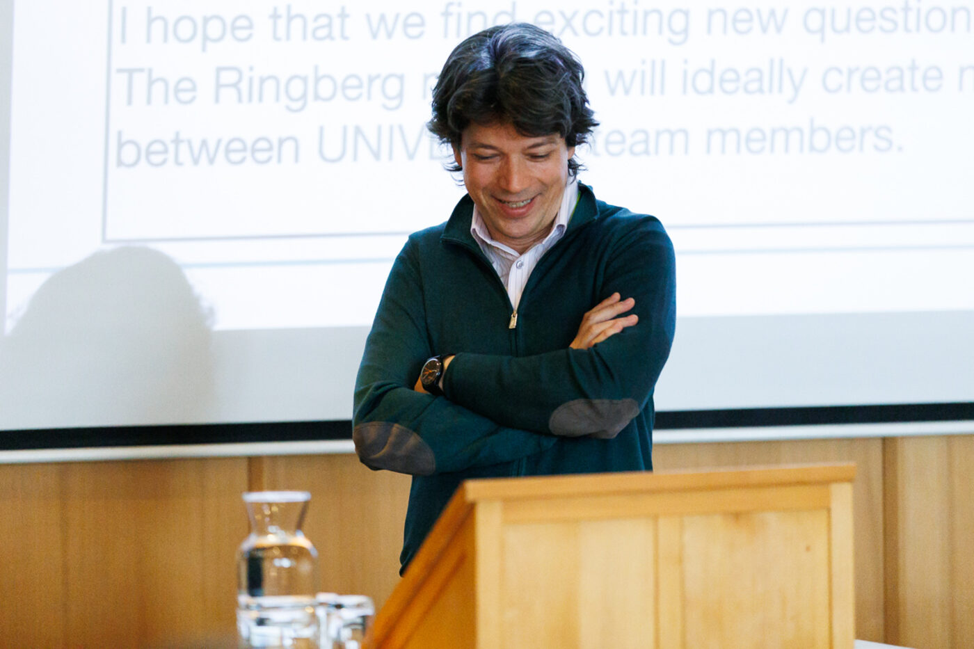 Johannes Henn speaking at a UNIVERSE+ retreat